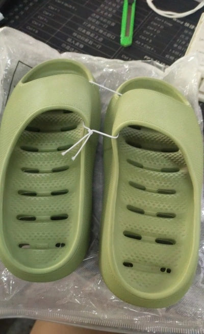 Thick-soled EVA slippers with water leakage design for home and bathroom use