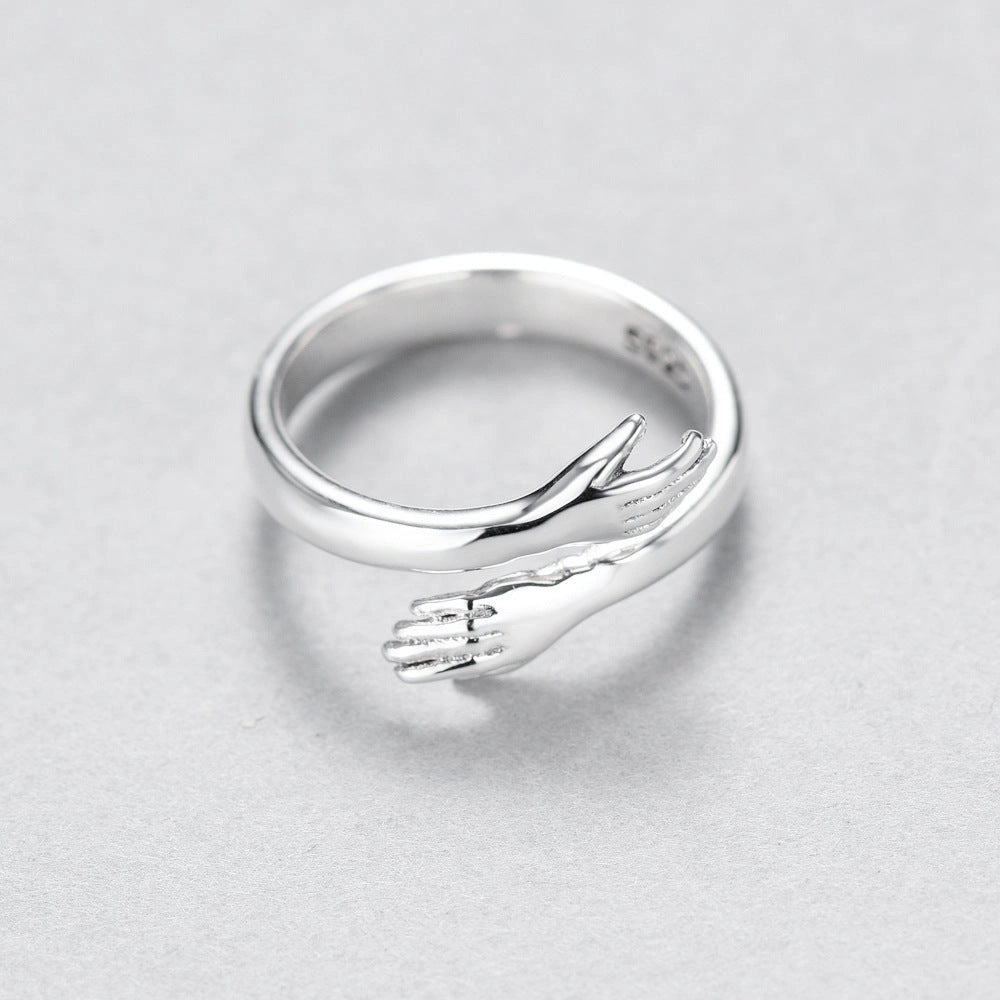Adjustable love hug couple ring in brass and electric degree white steel