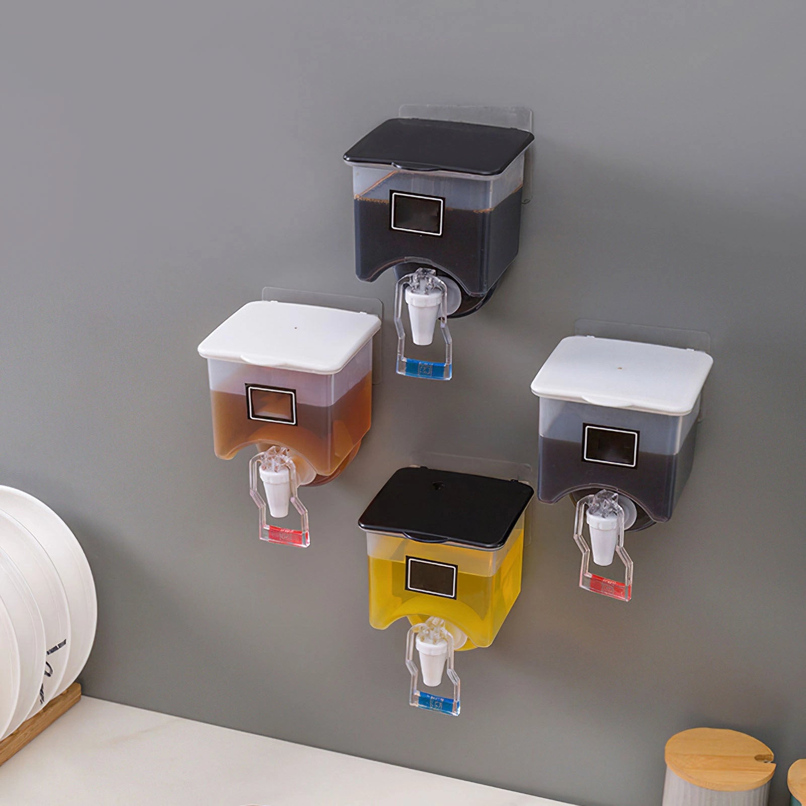 Wall-mounted condiment bottles with press handle for easy pouring