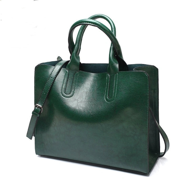 Sofia Spanish Trunk Tote with zipper opening and multiple compartments
