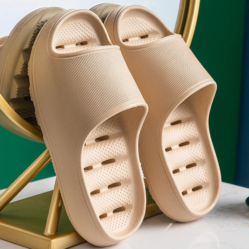 Thick-soled EVA slippers with water leakage design for home and bathroom use