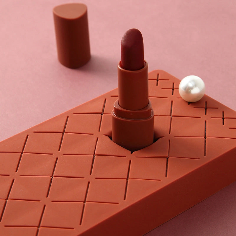 Silicone and ABS lipstick storage rack in vibrant colours