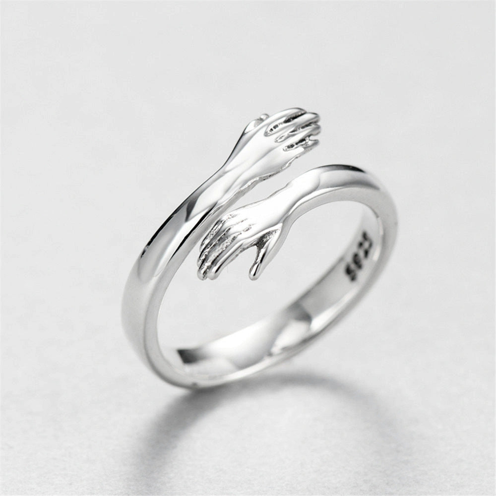 Adjustable love hug couple ring in brass and electric degree white steel