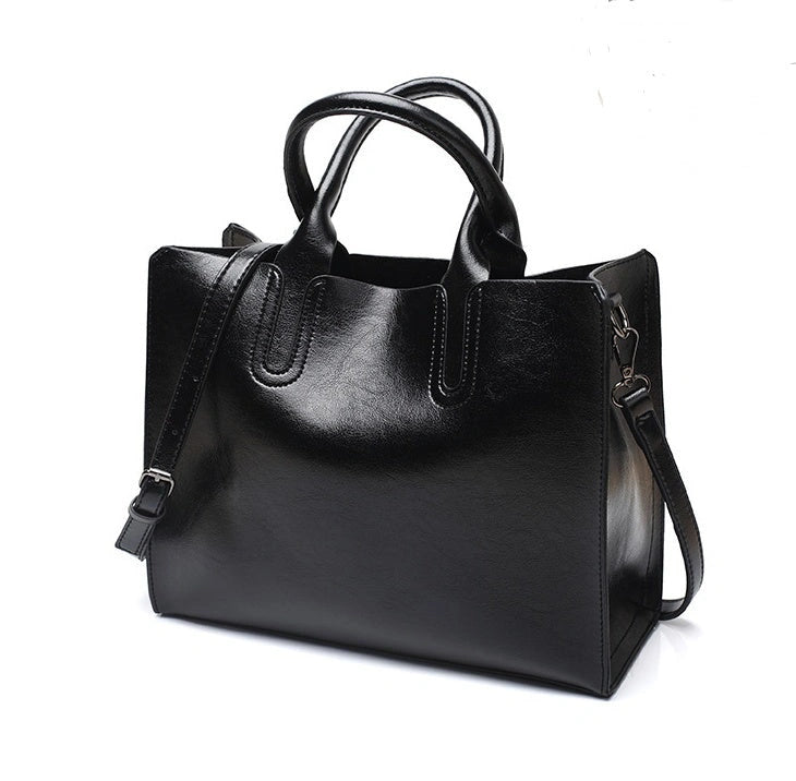 Sofia Spanish Trunk Tote with zipper opening and multiple compartments