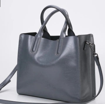 Sofia Spanish Trunk Tote with zipper opening and multiple compartments