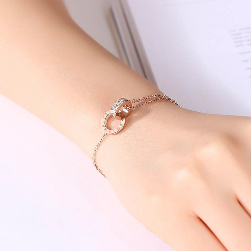 Rose gold titanium steel bracelet with zircon inlay