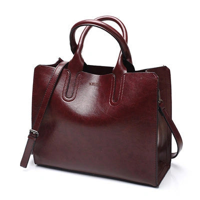 Sofia Spanish Trunk Tote with zipper opening and multiple compartments