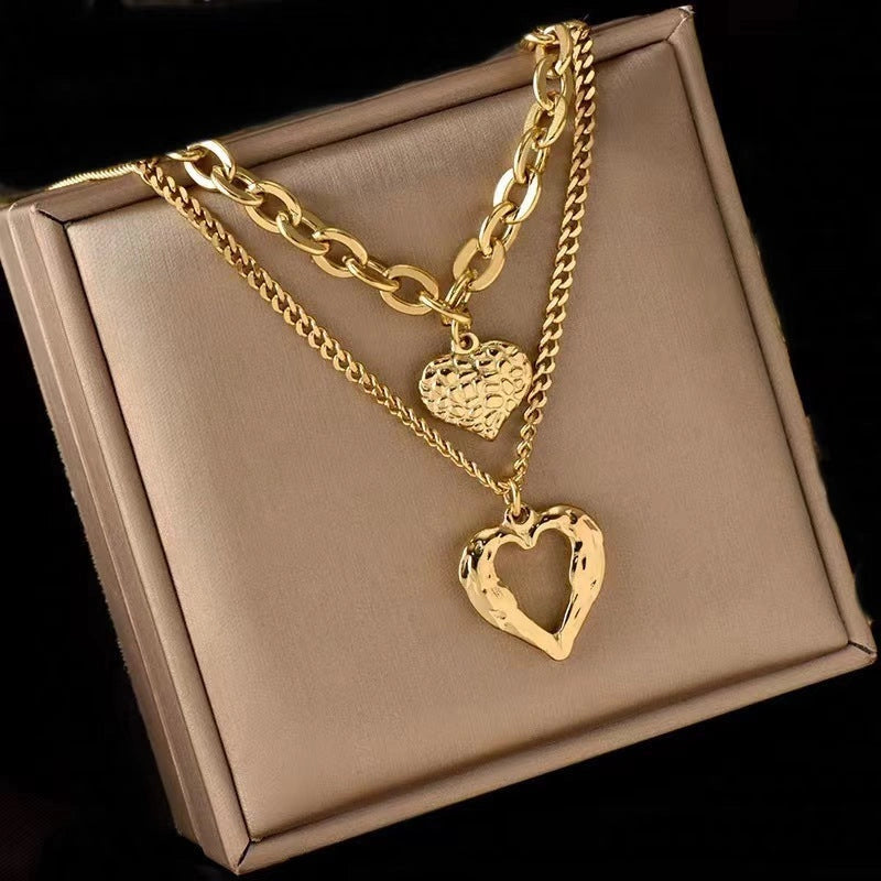 Titanium Steel Angel Wings Love Necklace with Irregular Folds and Heart Design