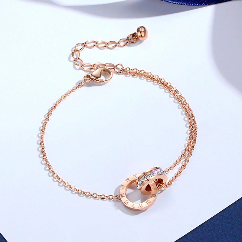 Rose gold titanium steel bracelet with zircon inlay