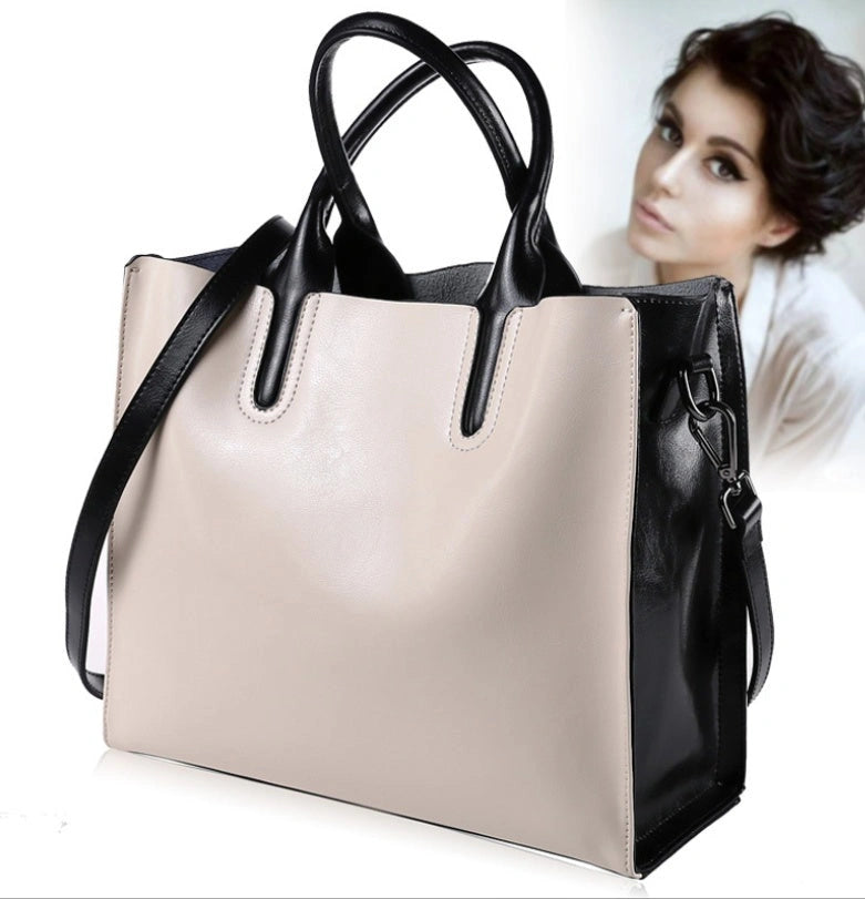 Sofia Spanish Trunk Tote with zipper opening and multiple compartments