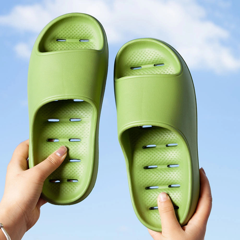 Thick-soled EVA slippers with water leakage design for home and bathroom use