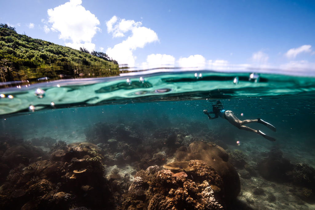 rhys logan fiji split shot taken with ikelite underwater housing