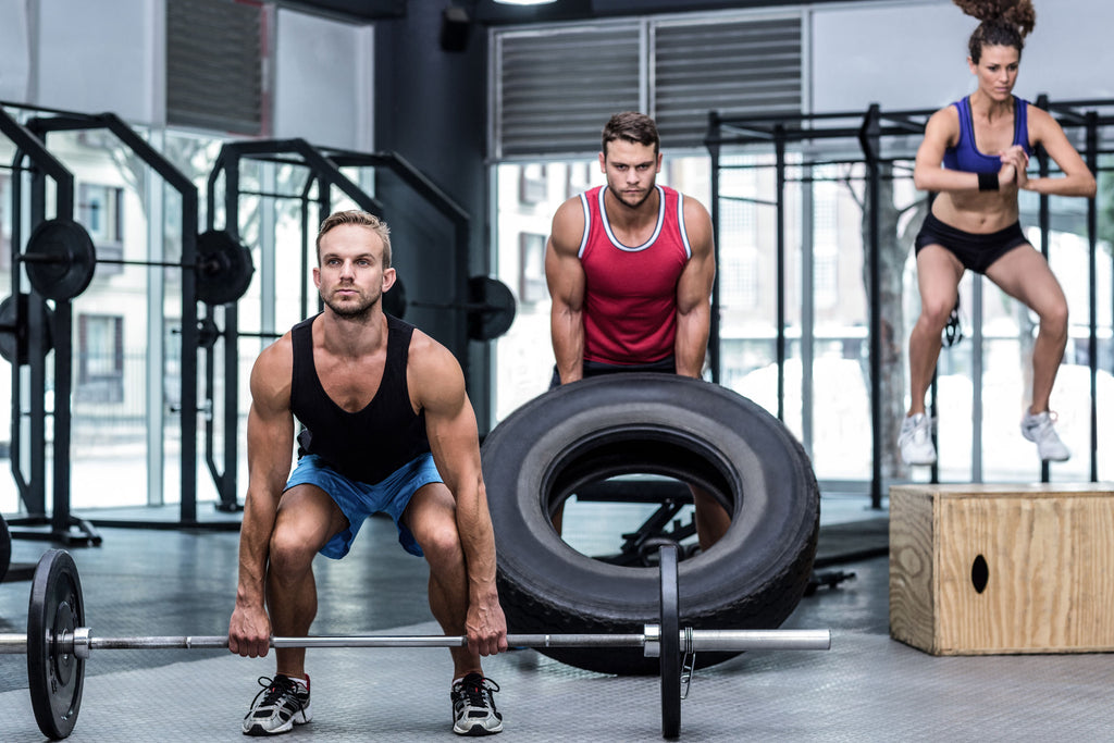 Athletes lifting weights