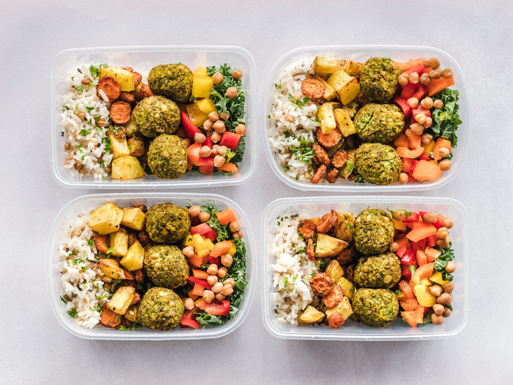  tupperware containers full of healthy food for a week’s worth of meals