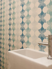 Lotus blue and green wallpaper by Jam Space used in the guest bathroom
