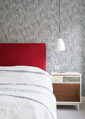 Teenager's bedroom, neutral colours with a splash of red