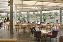Two sides of the restaurant are floor to ceiling glass wall, offering stunning views of the Nile