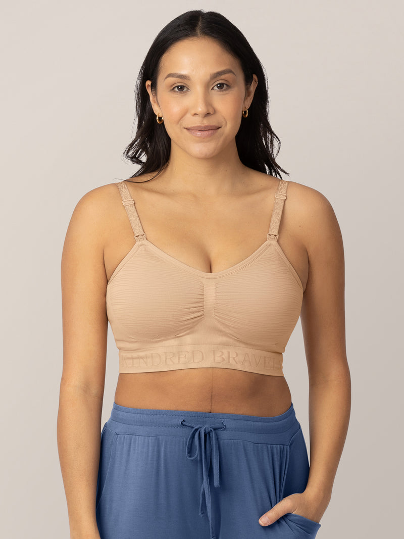 Front view of a model wearing the Sublime® Hands-Free Pumping & Nursing Bra in Beige