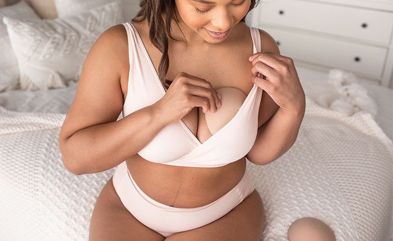 crossing nursing bra and breastfeeding pads