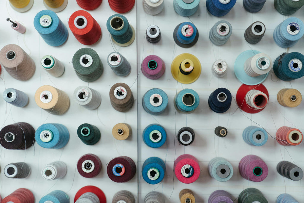 Different Colors of Thread Spools for Sewing Plushies