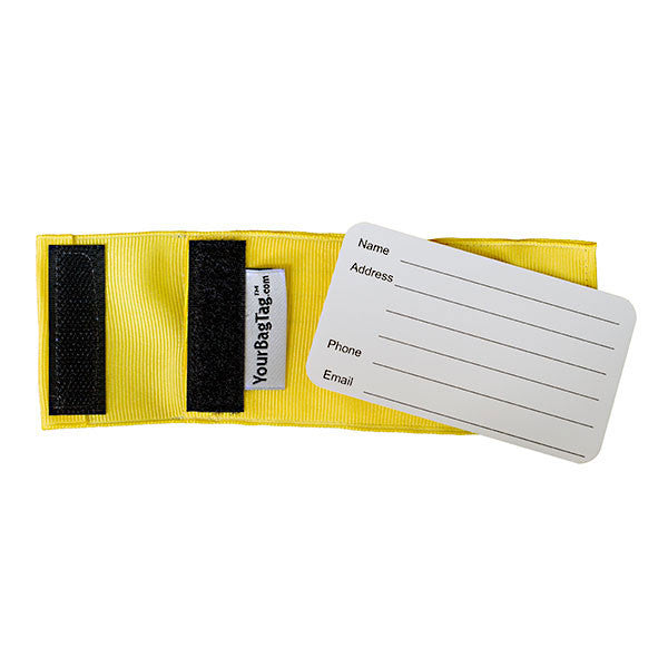 yellow luggage tags