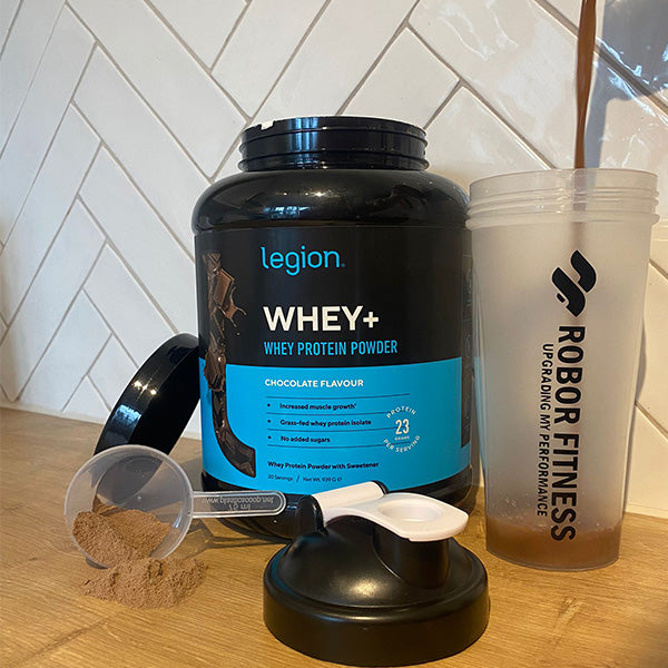 Legion Whey+ Protein Pouring into shaker