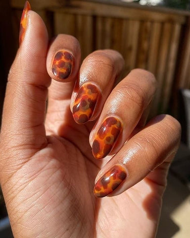 Tortoise Shell Nail Art by @lolo.nailedit using Cirque Colors