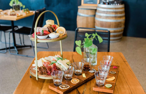 Bass Flinders Distillery Gin High Tea tiers of cakes sandwiches and gin paddles