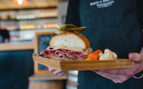 Bass Flinders Distillery Tasty Eats Food Menu Reuben sandwich served with fresh pickles