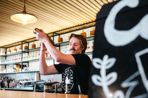 Bass Flinders Distillery bartender shaking cocktails during cocktail masterclass