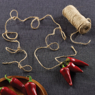 Hang to dry peppers to make hot pepper flakes