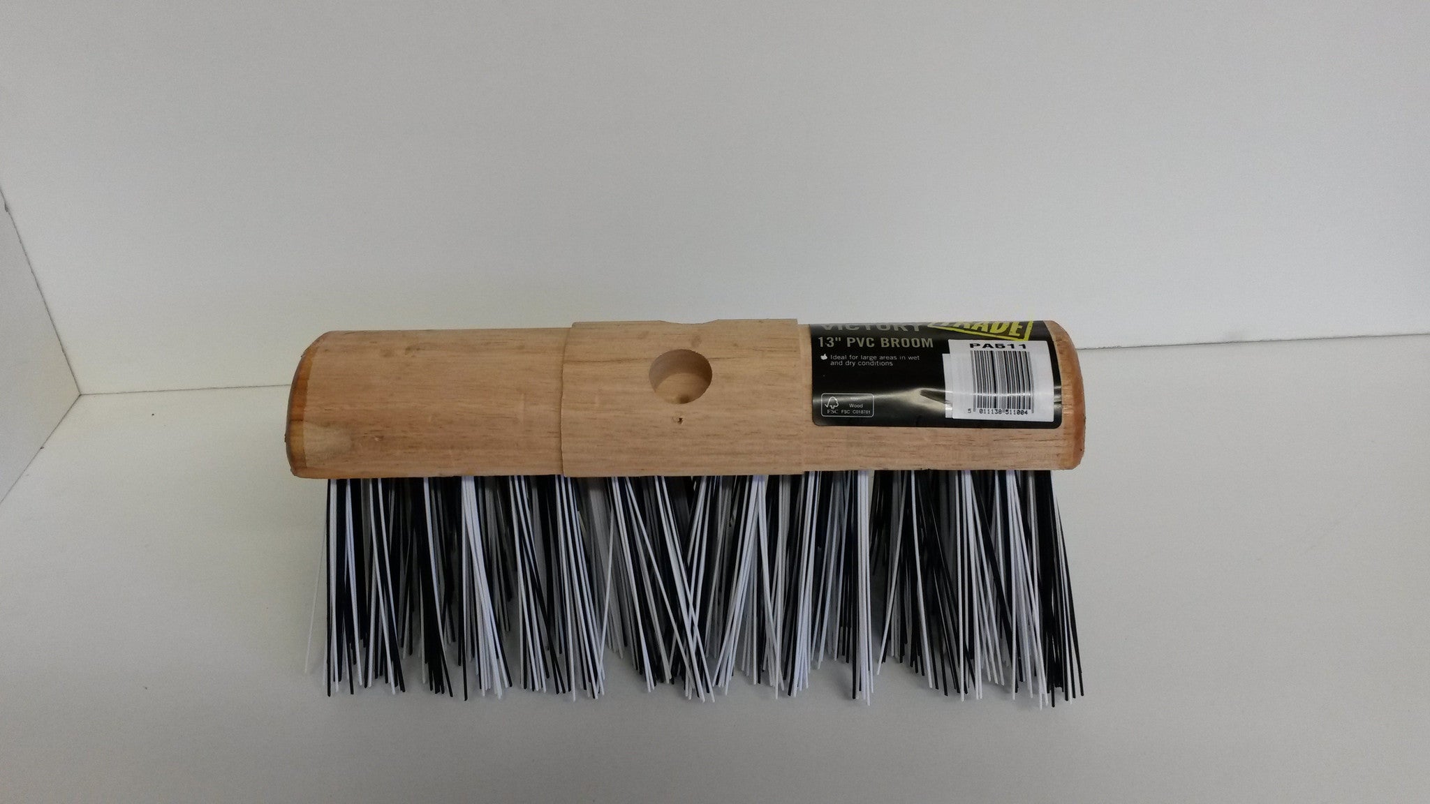 wooden yard brush