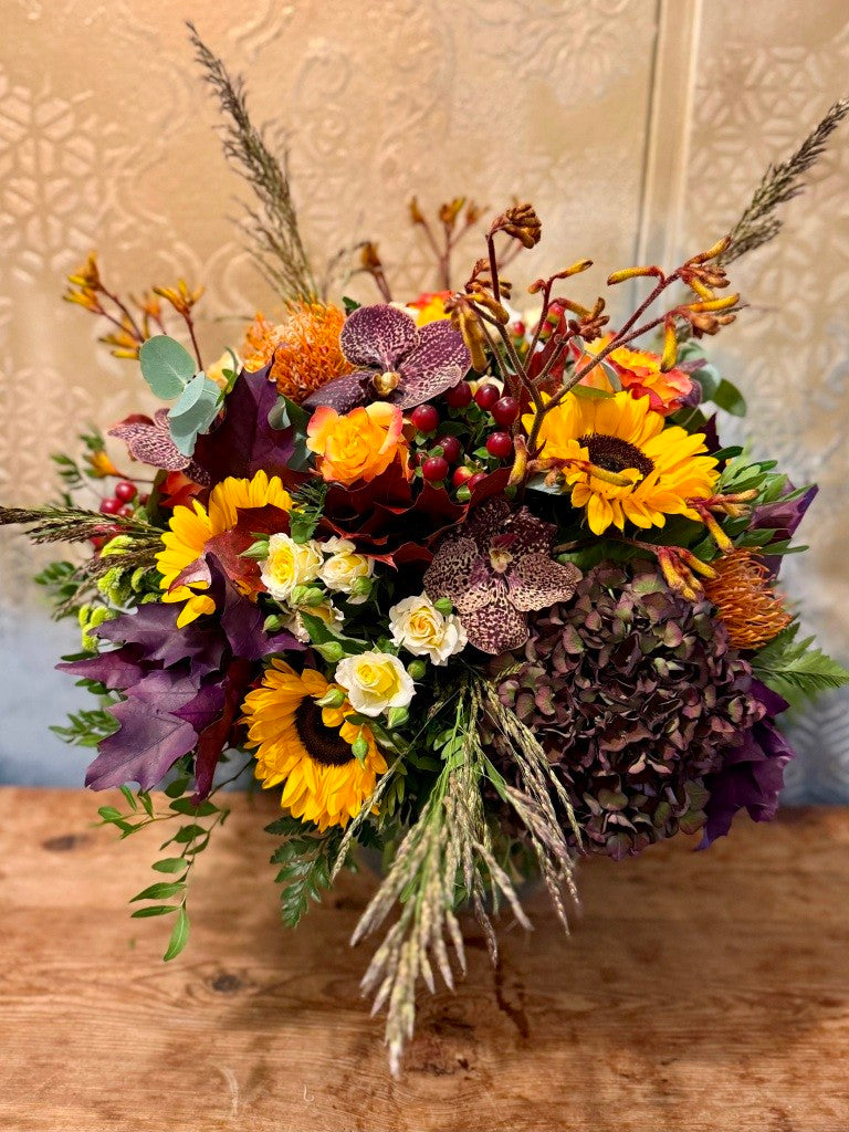Autumnal flower bouquet with sunflowers