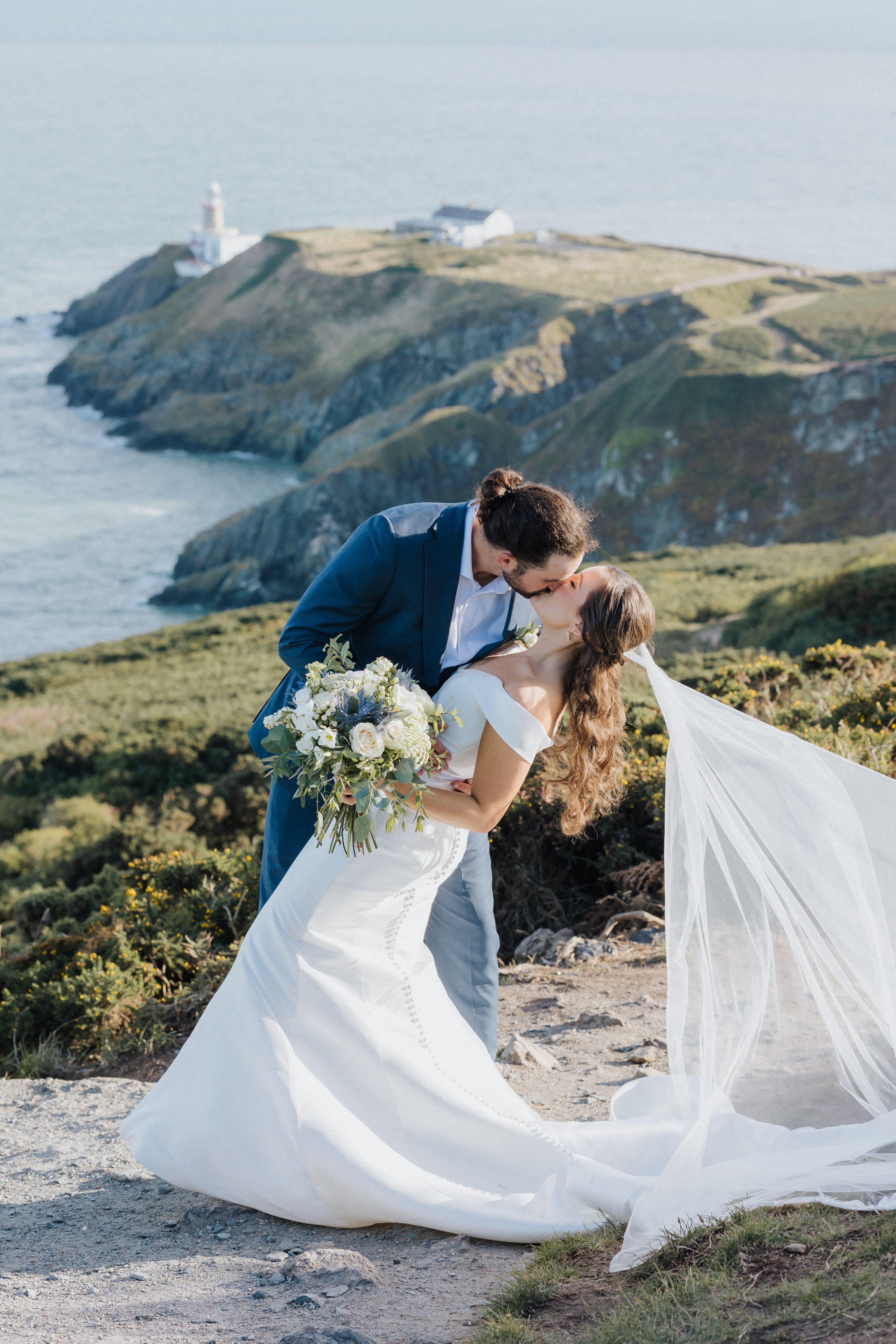 Bridal bouquet with white roses and thistle orion
