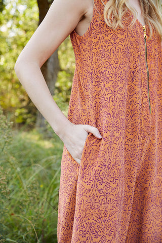 Close up of Stevie corduroy jumpsuit - front zipper closure and two side pockets.