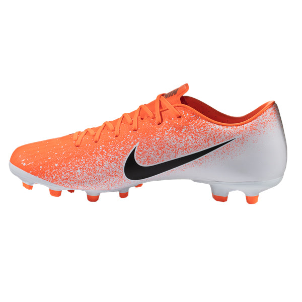 orange and white soccer cleats
