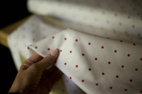 cream polka dot fabric