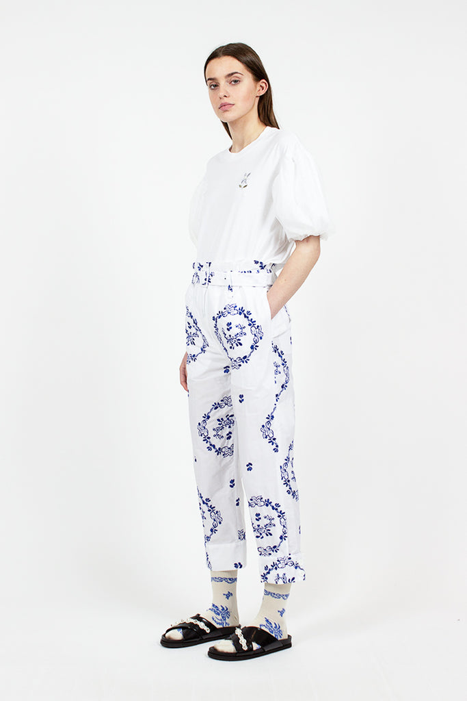 blue and white paper bag pants