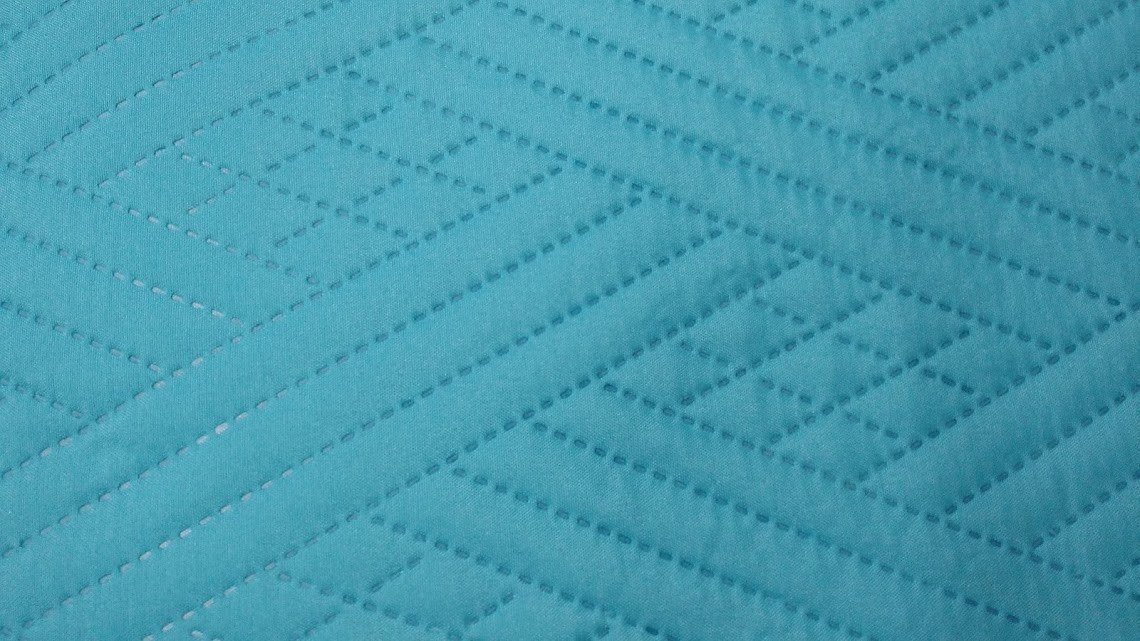 teal blue quilt