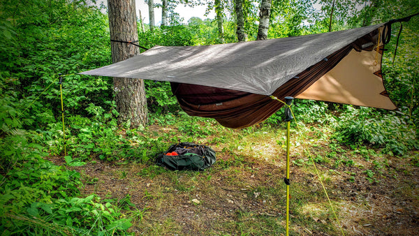 Go Outfiiter Landing Pad protecting gear under the Apex Campign Shelter Hammock Tarp and the GO! Camping Hammock 2.0