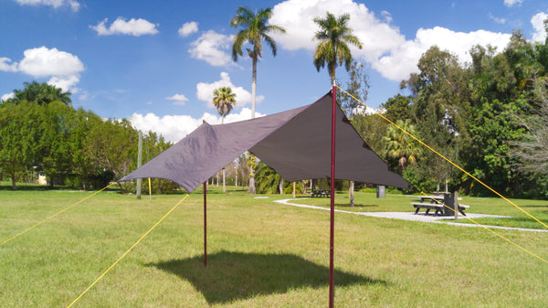 Use tarp poles or attache it to two trees to create a freestanding shade canopy or rain shelter. The hammock tarp can be used a general camping tarp too.