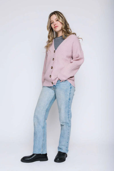 In the softest yarn ever, with a mohair style finish for a lofty look, you will adore this cardigan. Such pretty detailing - from the textural rib stitch to the faux horn buttons, this cardigan features a flattering v-neck and super stretchy fabric with a slouchy fit. 24" length from shoulder to hem, it looks great on its own or layered over a tank or tee.