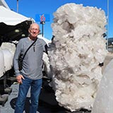 Bill took time to enjoy a very large quartz crystal cluster.