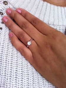 Madeligne's beautiful hand wearing her custom made surprise engagement ring