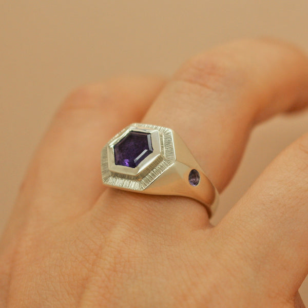 white gold mourning ring for ashes with purple amethyst hexagon stone and gemstone band