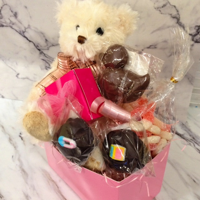teddy bear with chocolate basket