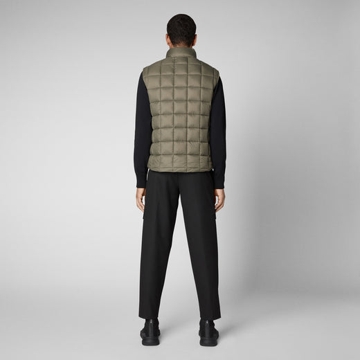 Model Front View of Men's Oswald Puffer Vest with Standing Collar in Mud Grey