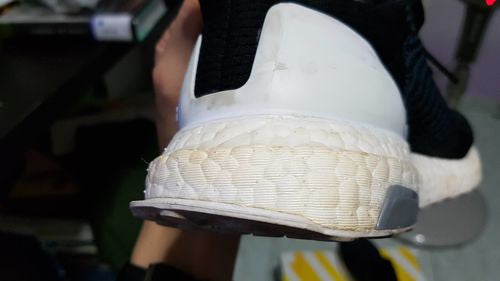 What causes the white ADIDAS Ultra 