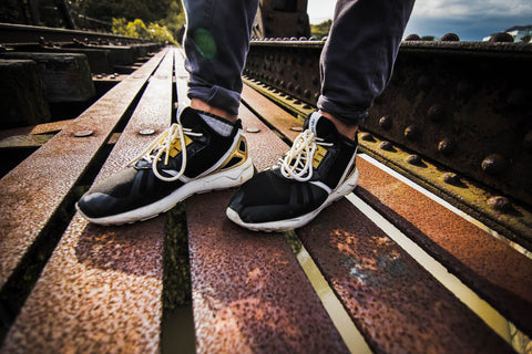 adidas tubular gold trim