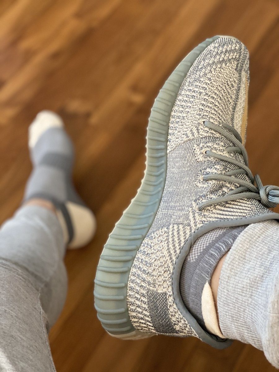 cream yeezys on feet